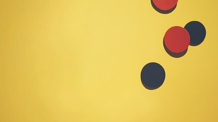 Red and black circles on a yellow background