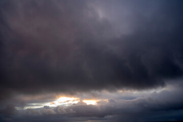 Fototapeta premium Panorama view of cloudy dramatic sky. Nature, travel, or vacation concept