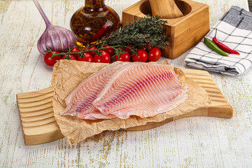 Raw Tilapia fish fillet slice
