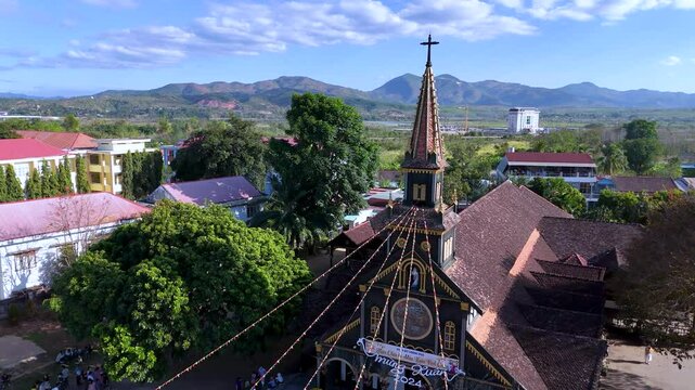 The famed wooden church or Nha Tho Go, or the Catholic Kon tum Cathedral, in the city of Kon tum in the Central Highlands of Vietnam. Travel concept
