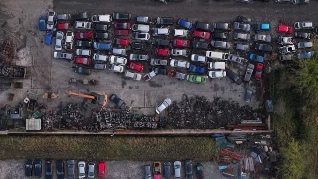 Bird's Eye View Of Unused And Broken Cars At Scrapyard In County Kildare, Ireland. - aerial shot