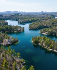 Fototapeta premium drone view over beautiful lake with little forest islands
