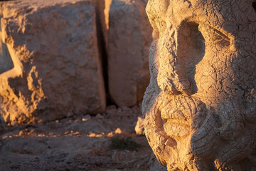 Head of Zeus at West terrace at the Mount Nemrut in southeastern Turkey at sunset