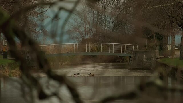 Establishing shot of bridge over La Morges river in Morges in Canton of Vaud Switzerland
