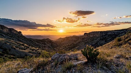 Obraz premium Stunning sunset over remote mountain landscape nature photography tranquil desert environment wide-angle view