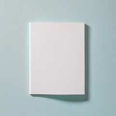 White blank magazine cover mockup on blue background.