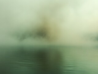 Fototapeta premium Misty lake at dawn, serene and calm.