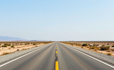 A scenic road winds through a dramatic desert landscape, with towering red rock cliffs and a clear blue sky in the background.
