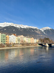 Innsbruck in Austria Tyrol with traditional buildings and Alpine peaks panoramic view karwendel vertical