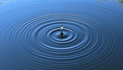 Water Drop Impact: Serene Blue Ripples Abstract Photography