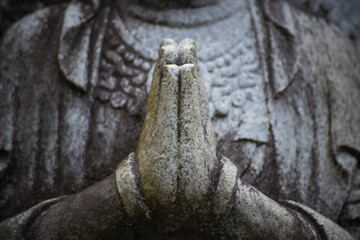 A religious stone statue of Bodhisattva Samantabhadra at Japanese buddhism temple