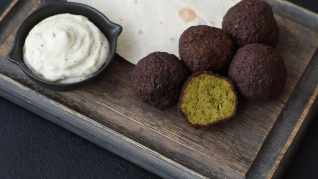 Fried chickpea falafel balls with salt, spices and herbs. Vegetarian and vegan dish