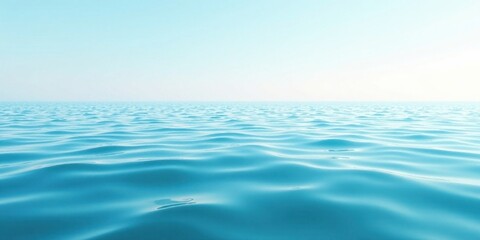 Obraz premium Serene Ocean Surface A Tranquil Seascape of Gentle Waves Under a Clear Sky