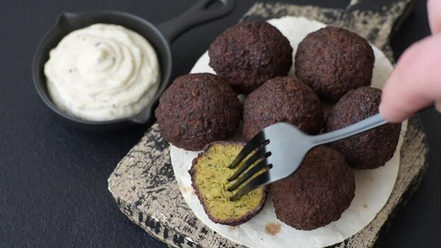 Fried chickpea falafel balls with salt, spices and herbs. Vegetarian and vegan dish