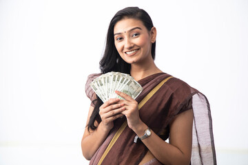 Nice Wife Smiling While Holding 500 Indian Rupee Notes In Her Hand