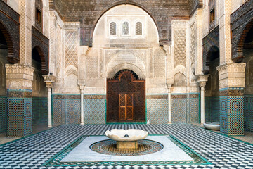 Tiled courtyard of the islamic school, Al Attarine Madrasa, Fes, Morocco