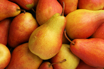 Fresh ripe juicy pears as background, closeup