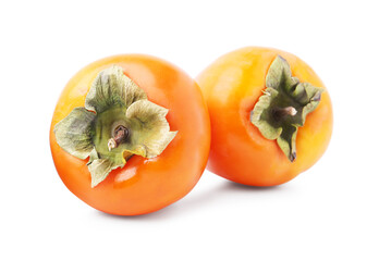 Delicious ripe juicy persimmons isolated on white
