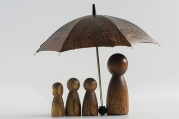 Playful Family Figurines Under Umbrella