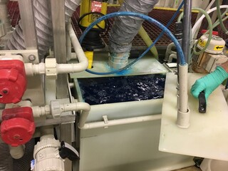 Industrial Chemical Processing System with Liquid Tanks and Pipes