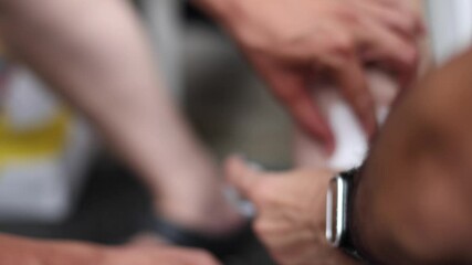 Dressing wound care with gauze, close-up of Medical bandage on patient leg