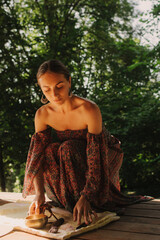 Woman practicing yoga and meditation in a Buddhist temple, relaxed with closed eyes. Mindful...