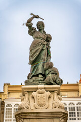 Obraz premium Galicia, Spain - August 23, 2024: Front View of Maria Pita Sculpture in Main Square of Curuna