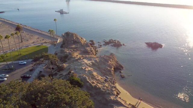 Newport Beach, Jetty Canal, Port Harbor - Orange County, Southern California Coast, USA. Corona Del Mar Pirates Cove Cliffs. Newport Bay Harbour Jetty Entrance. Sail Boat going into Port