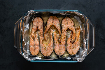 Trout steaks baked in the oven on foil.