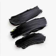 A photostock of abstract black brush strokes, painted in bold and dynamic patterns, displayed artistically on a clean white background. High Quality
