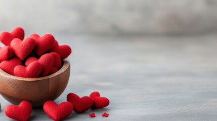 Red Felt Hearts in a Wooden Bowl on a Light Gray Background for Romantic and Holiday Themes