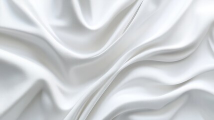 Obraz premium Elegant white silk fabric with soft folds and waves.