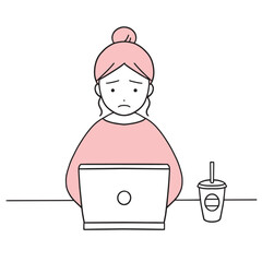 ドリンクを飲みながらpcを触る困った表情の女性