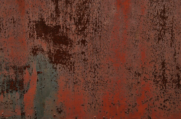 Rusty metallic grunge surface with peeling paint texture
