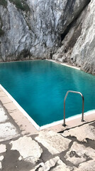 Teal Pool in Rocky Cove: A Photo