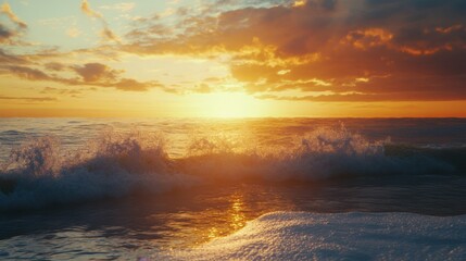 sunset over scenic coastline, crashing waves, golden light, dramatic sky, serene ocean view, peaceful beach, vibrant colors, nature's beauty, tranquil atmosphere