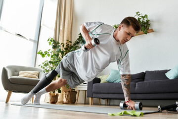 Young man with prosthetic leg exercising at home with determination and strength