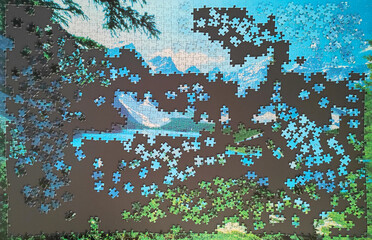Partially Completed Jigsaw Puzzle of a Mountain View