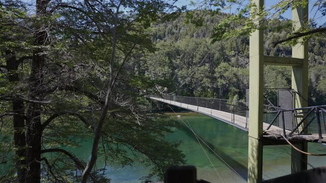 Suspension Bridge Over of Arrayanes River in Los Alerces National Park, Patagonia, Argentina
