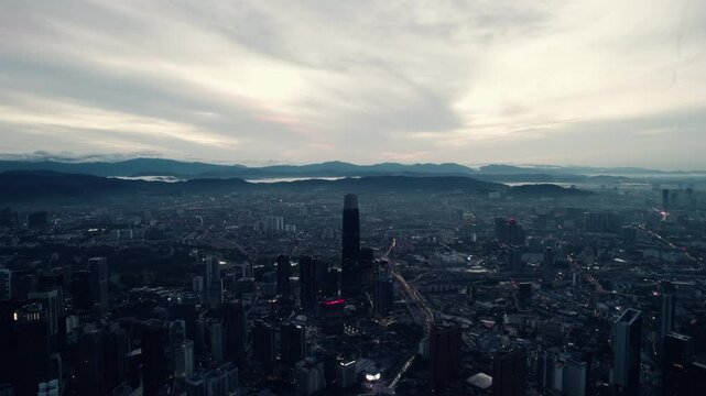 The Exchange 106 supertall skyscraper in center at dawn twilight, Tun Razak Exchange finance and business center, Kuala Lumpur, Southeast Asia, Panoramic drone view