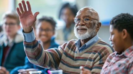An elderly student engages in a classroom setting, eagerly raising his hand to contribute to the discussion among younger classmates