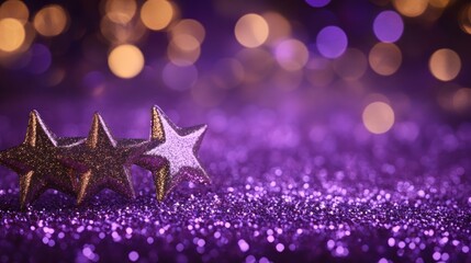 Three gold stars on purple glitter background with bokeh lights.