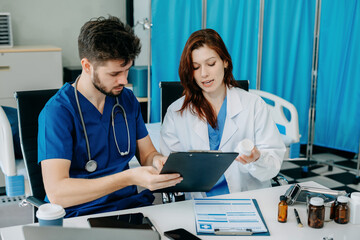 Medical Team Analyzes Patient Information and Medication Chart.