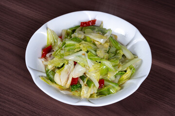 Pickled pepper and lotus flower white on a plate