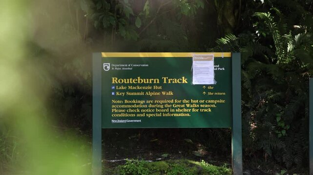 Wooden sign of the Routeburn Track in Otago region in the South Island of New Zealand