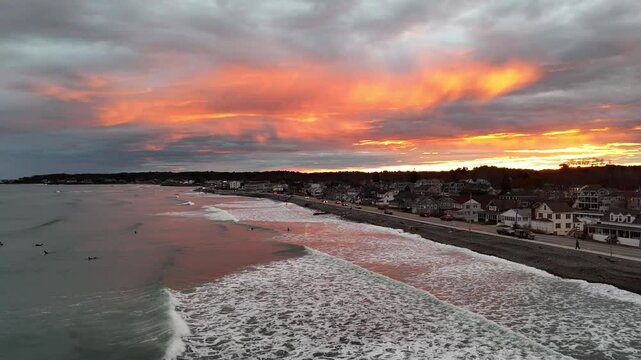 Aerial footage of the Long Sands Beach at sunset in Tynemouth town in Tyne and Wear, England, UK