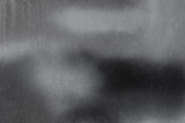 black and white background, in the photo a blurred wall painted in black and white