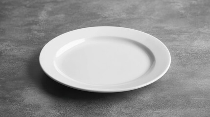 Empty White Plate on Grey Textured Surface.