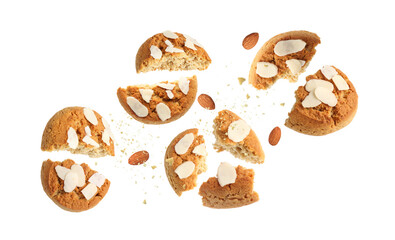 Yummy nut cookies with almond petals in air on white background