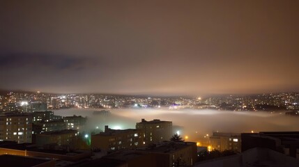 Fototapeta premium A quiet night with rolling fog over a radiant, futuristic metropolis.